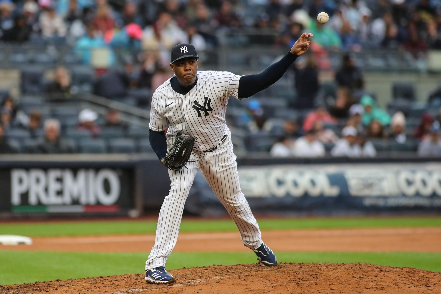 Oct 2, 2022; Bronx, New York, USA; New York Yankees relief pitcher Aroldis Chapman (54) throws to first on a pick off attempt in the seventh inning against the Baltimore Orioles at Yankee Stadium. Mandatory Credit: Wendell Cruz-USA TODAY Sports